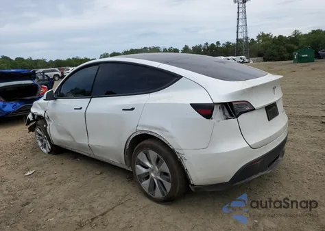 2023 Tesla Model Y из США, поврежденный, VIN 7SAYGAEE0PF641124